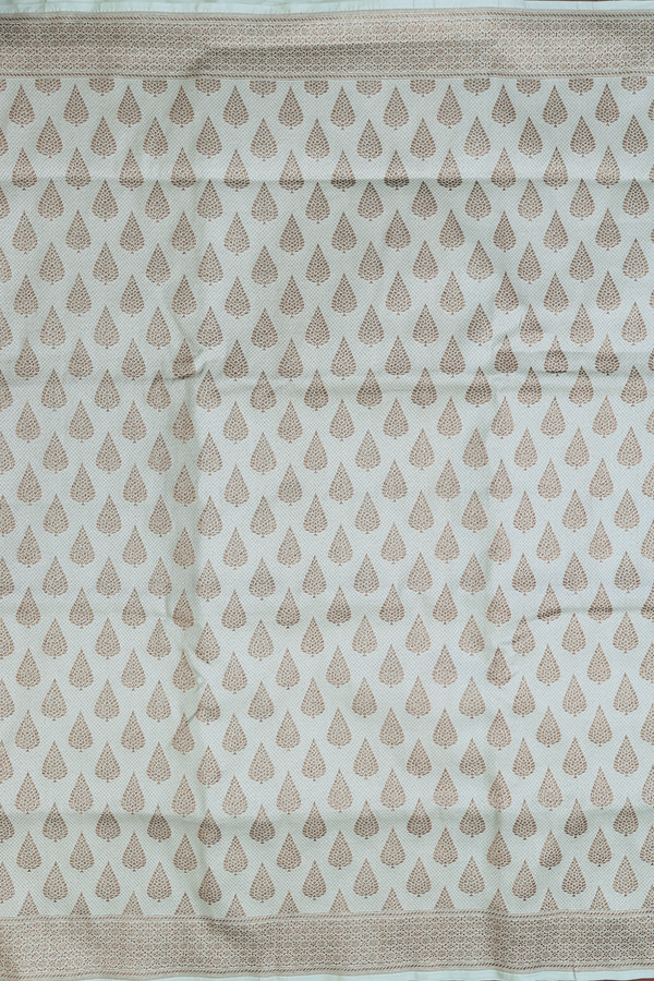 Banarasi Silk Saree In Pale Green With Zari Buttas