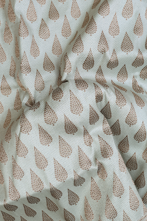 Banarasi Silk Saree In Pale Green With Zari Buttas