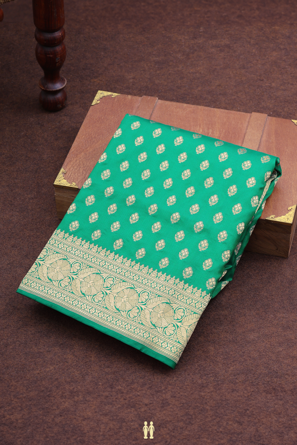 Banarasi Silk Saree In Emerald Green With Floral Buttas