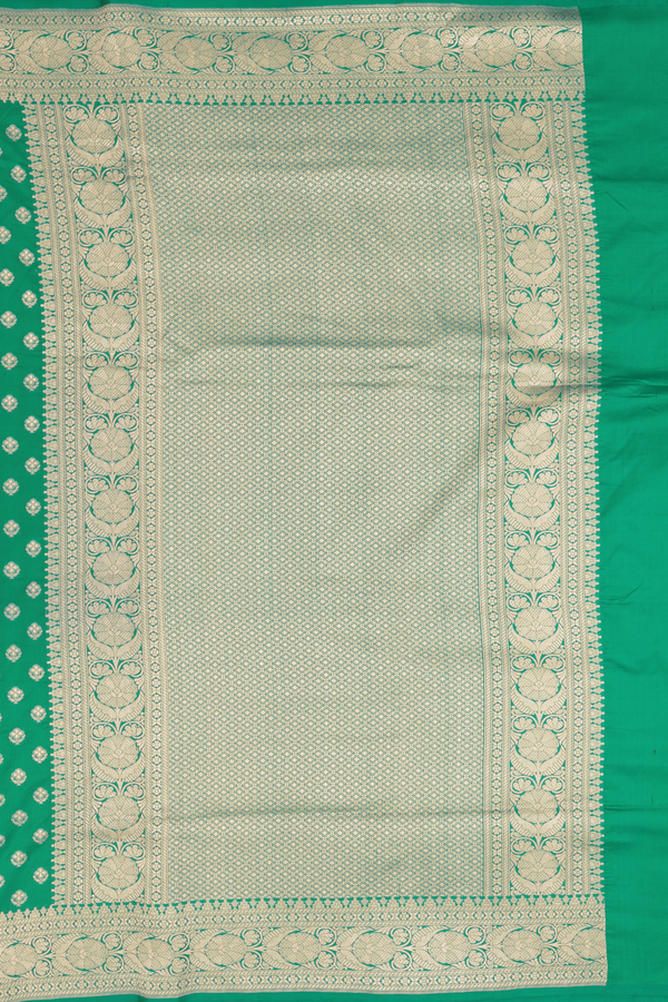Banarasi Silk Saree In Emerald Green With Floral Buttas