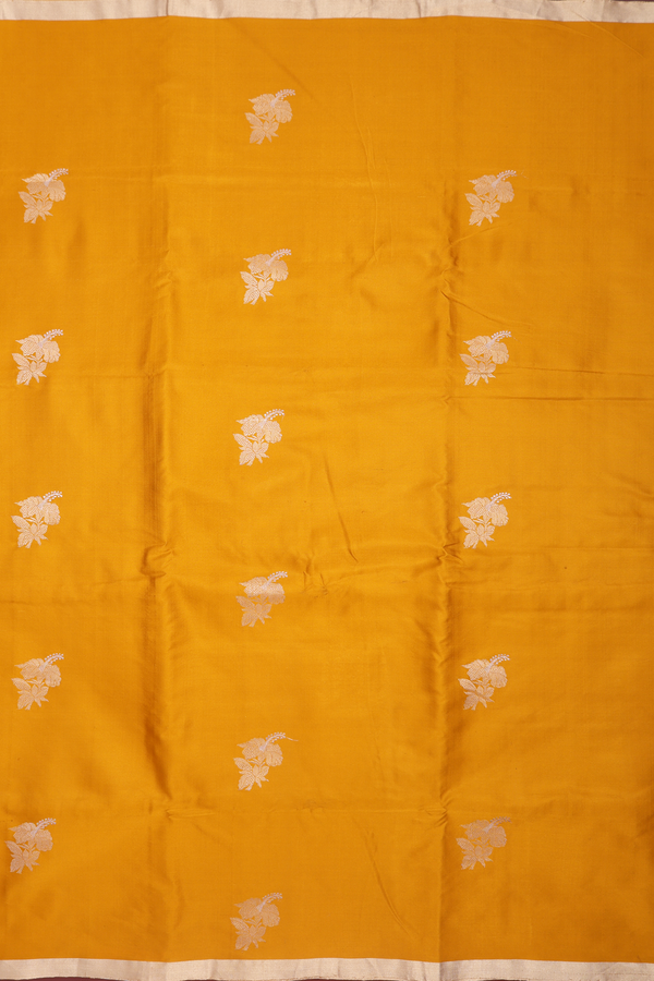 Banarasi Silk Saree In Mustard Yellow With Floral Buttas