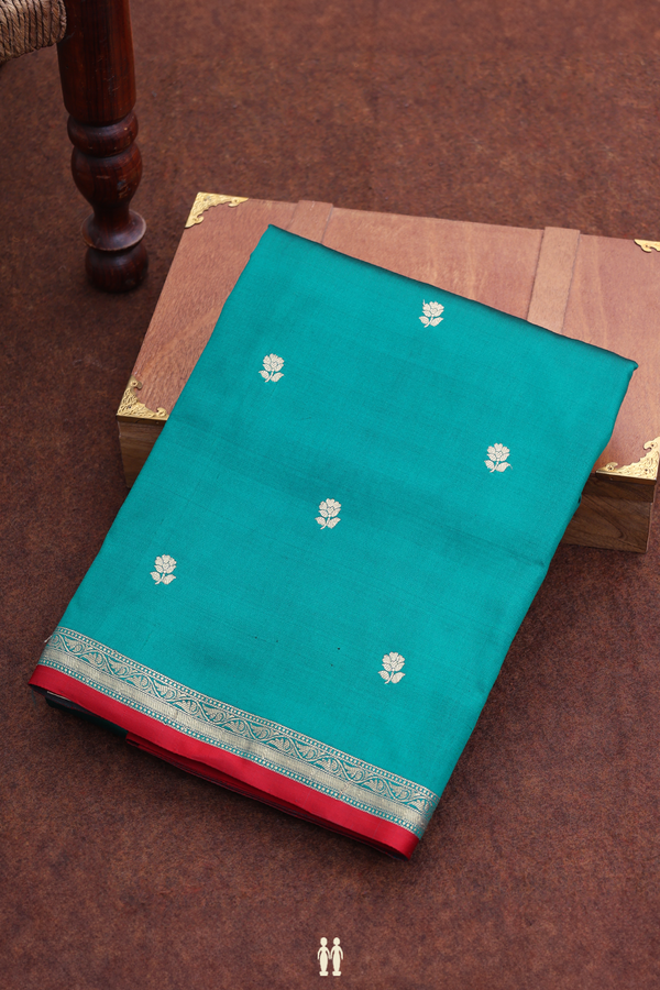 Banarasi Silk Saree In Teal Green With Floral Buttas
