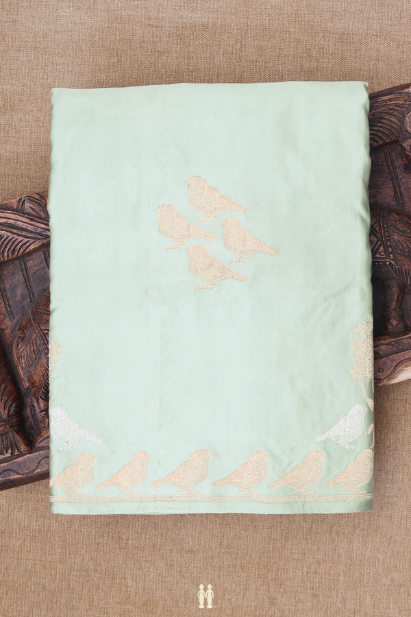 Banarasi Silk Saree In Sage Green With Birds Buttas