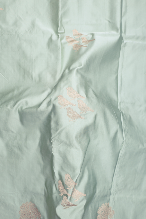 Banarasi Silk Saree In Sage Green With Birds Buttas