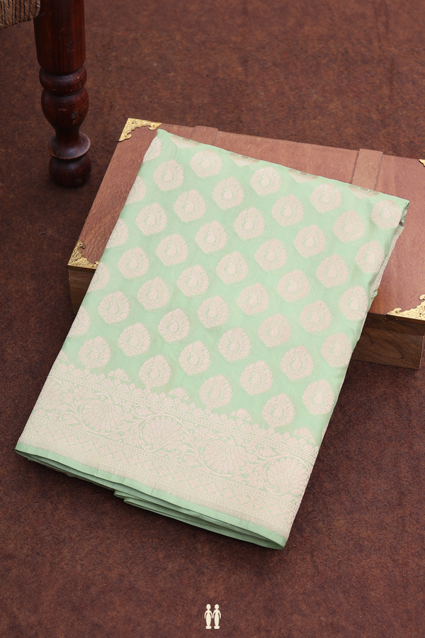 Banarasi Silk Saree In Pastel Green With Zari Buttas
