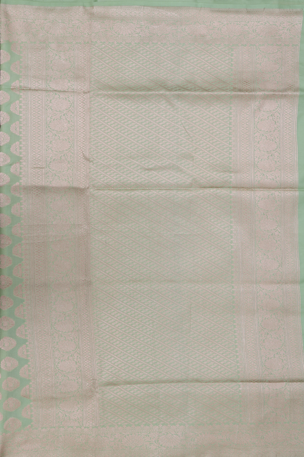 Banarasi Silk Saree In Pastel Green With Zari Buttas