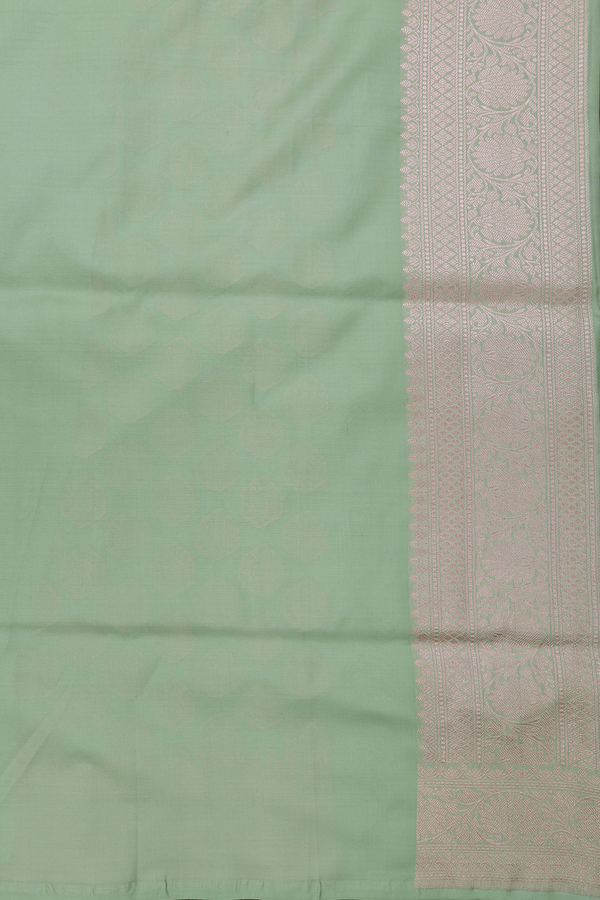 Banarasi Silk Saree In Pastel Green With Zari Buttas
