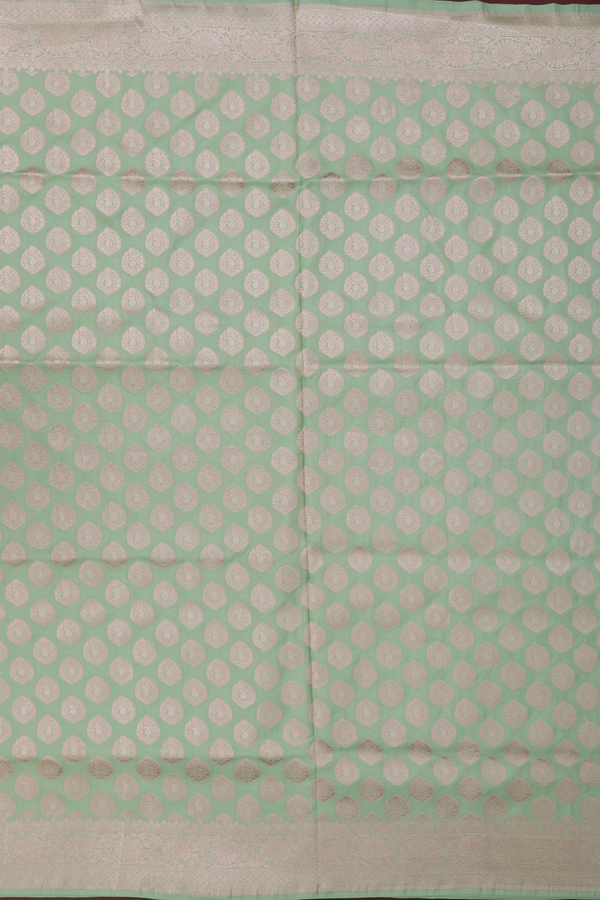 Banarasi Silk Saree In Pastel Green With Zari Buttas