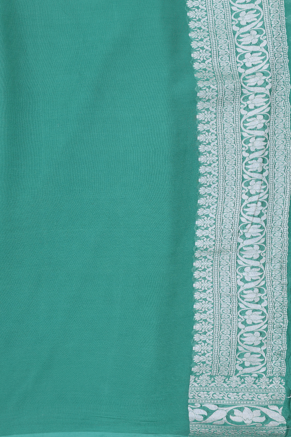 Georgette Banarasi Silk Saree In Green With Floral Buttas