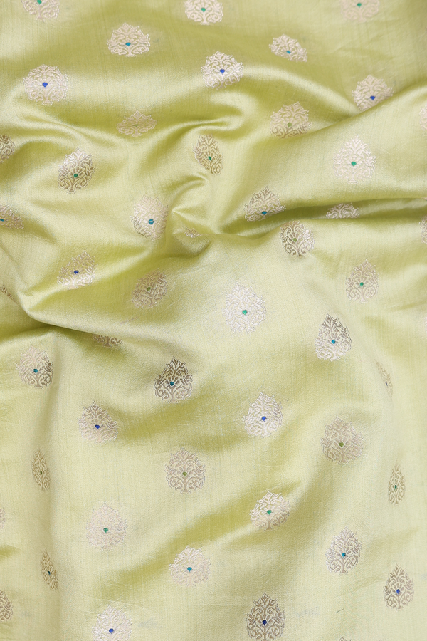 Banarasi Silk Saree In Green With Zari Buttas