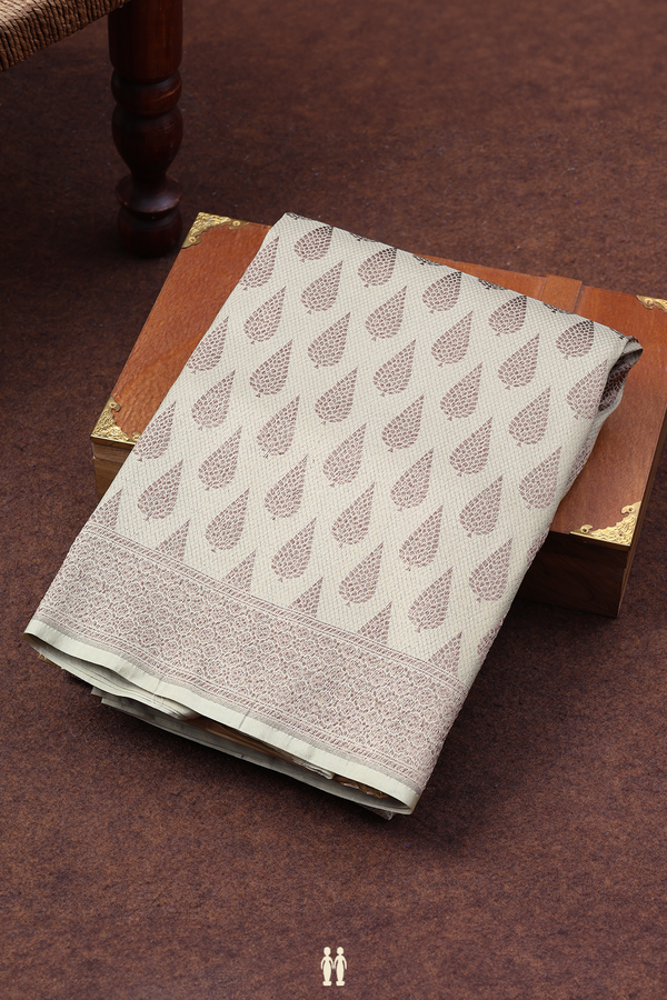 Banarasi Silk Saree In Sage Green With Zari Buttas