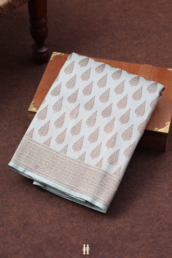 Banarasi Silk Saree In Pale Green With Zari Buttas