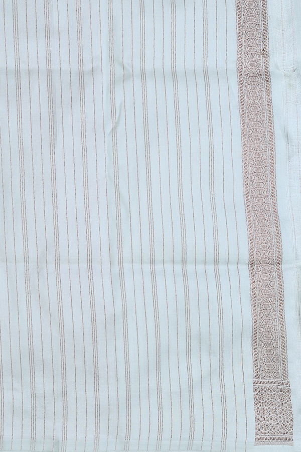 Banarasi Silk Saree In Pale Green With Zari Buttas