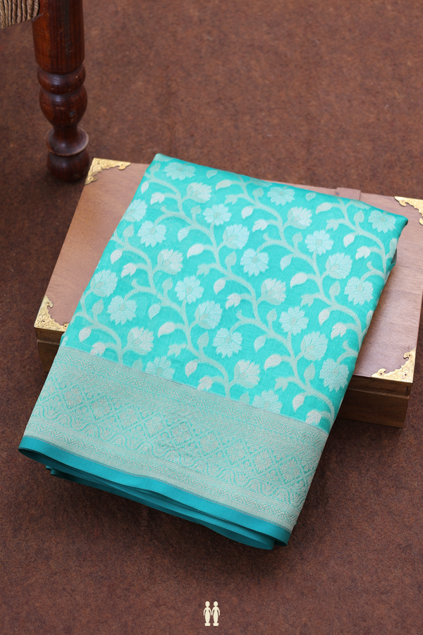 Kora Banarasi Silk Saree In Sea Green With Floral Design