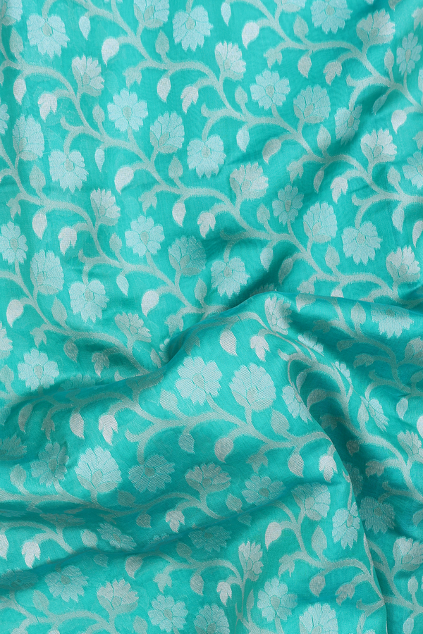 Kora Banarasi Silk Saree In Sea Green With Floral Design