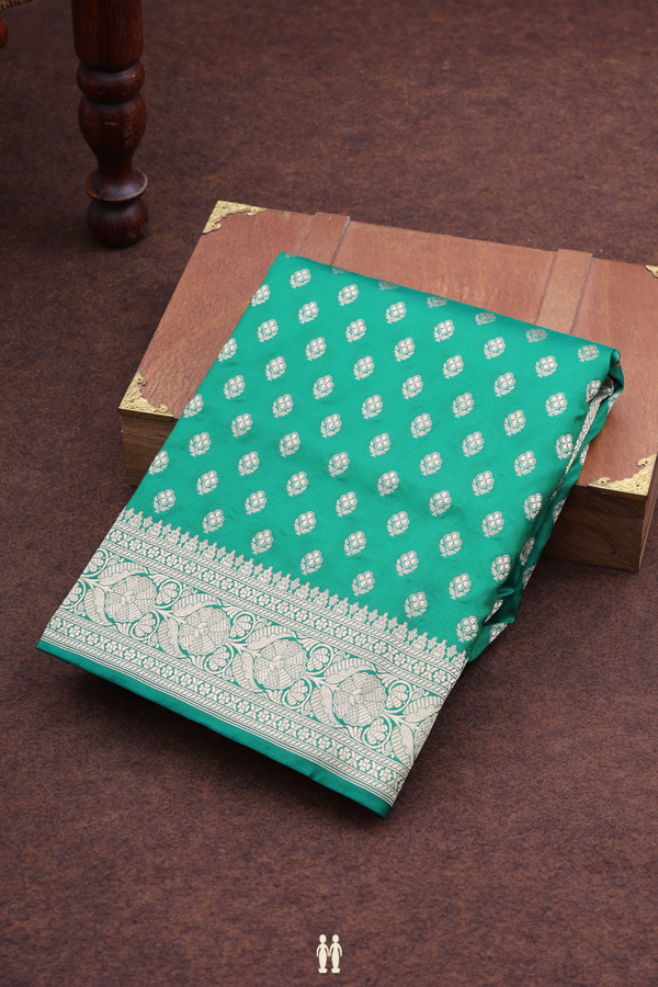 Banarasi Silk Saree In Emerald Green With Floral Buttas