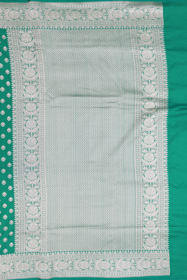 Banarasi Silk Saree In Emerald Green With Floral Buttas