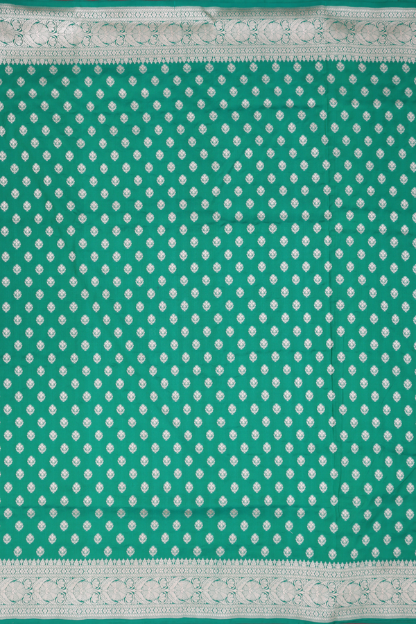 Banarasi Silk Saree In Emerald Green With Floral Buttas