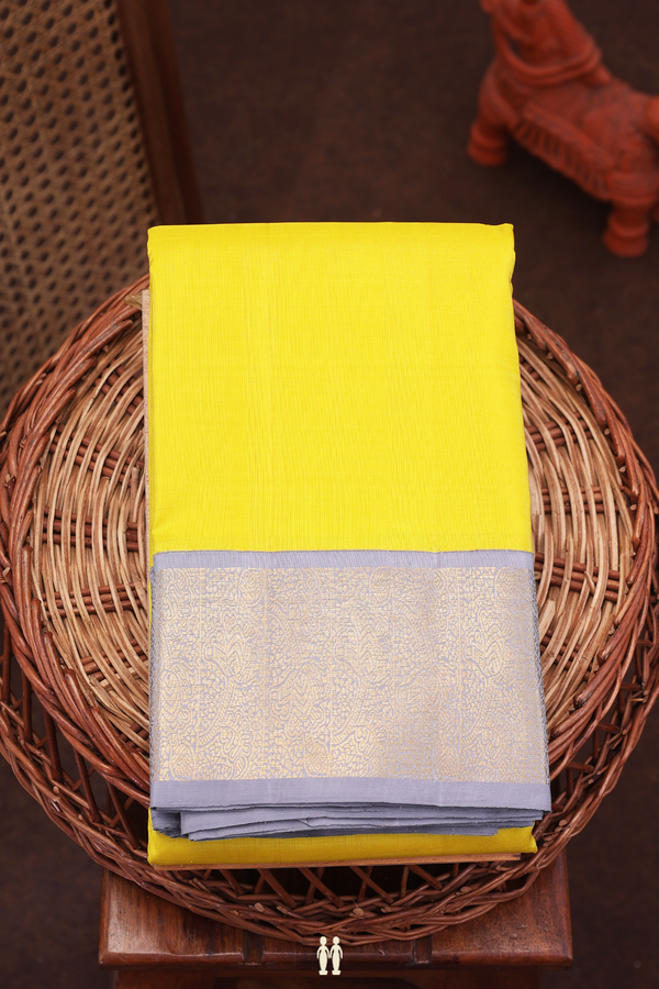Kanchipuram Silk Saree In Plain Yellow With Korvai Border