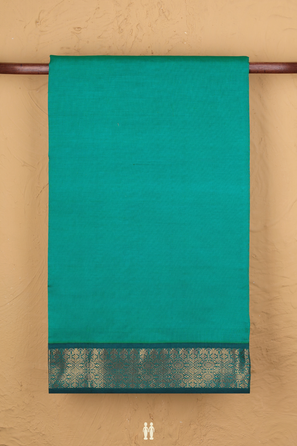 Poly Cotton Saree In Green With Zari Border