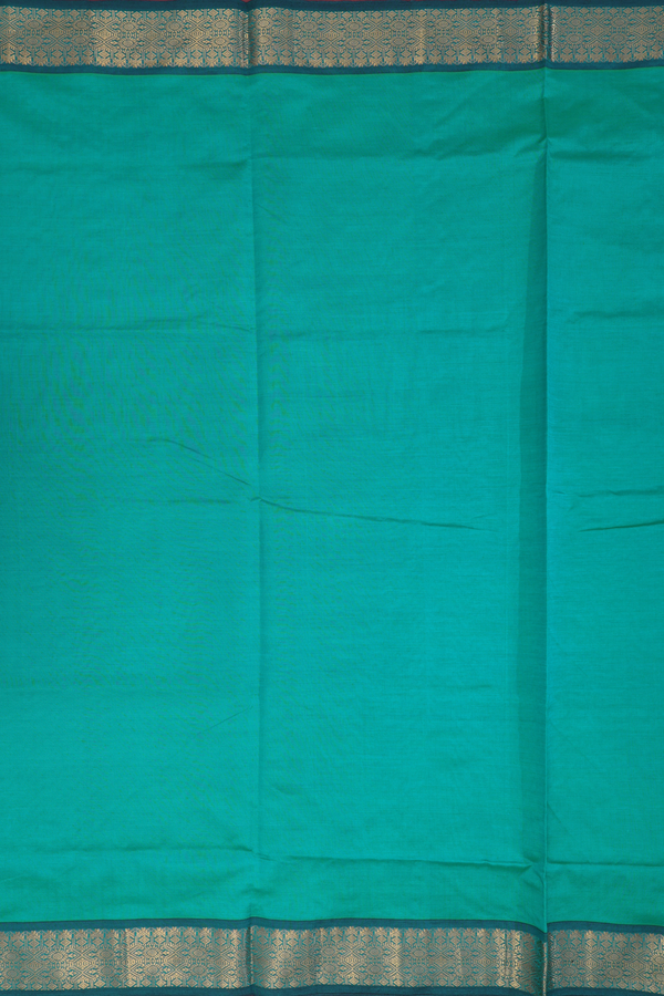 Poly Cotton Saree In Green With Zari Border