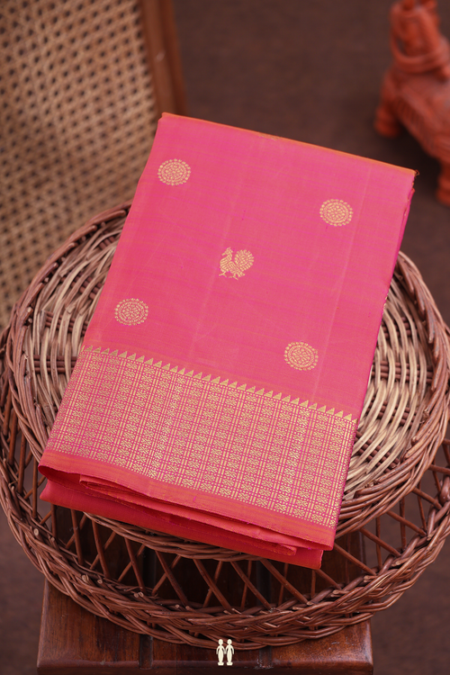 Kanchipuram Silk Saree In Coral Pink With Peacock Buttas