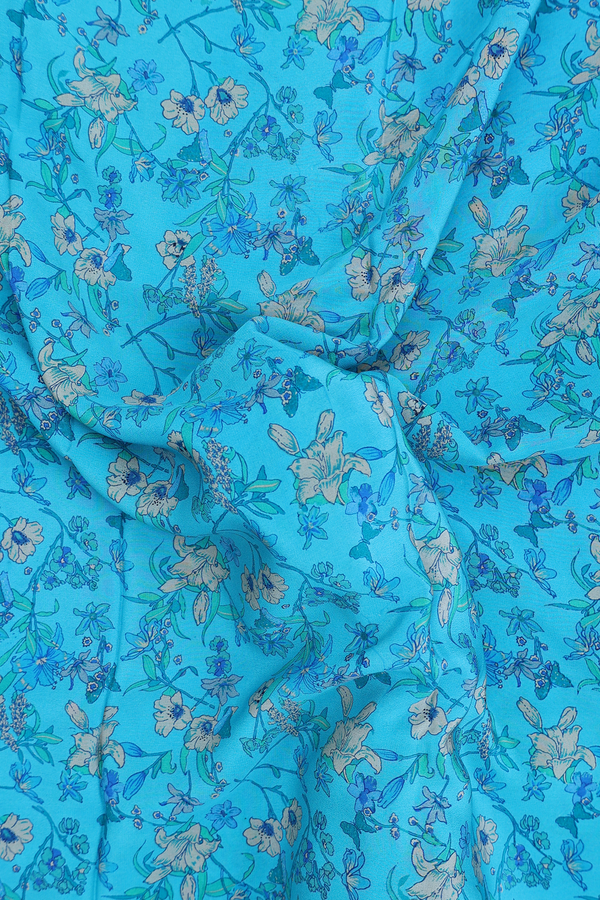 Crepe Saree In Cerulean Blue With Floral Design