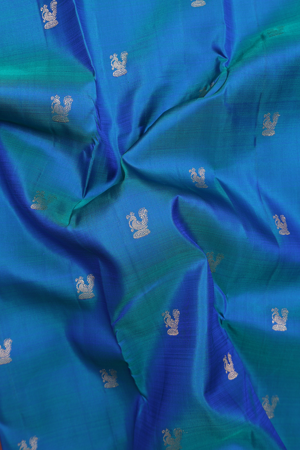 Kanchipuram Silk Saree In Peacock Blue With Peacock Buttas