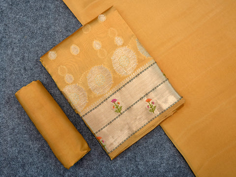 Meenakari Work Border With Floral Buttas Yellowish Beige Raw Silk Unstitched Salwar Material