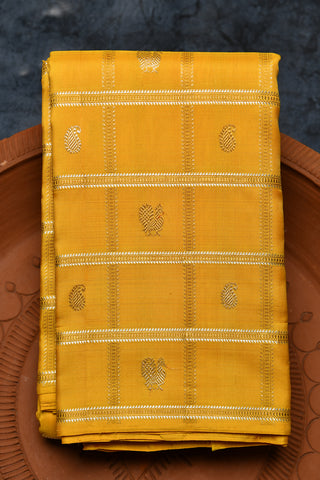 Silver And Gold Zari Checked With Paisley And Peacock Motif Deep Yellow Kanchipuram Silk Saree