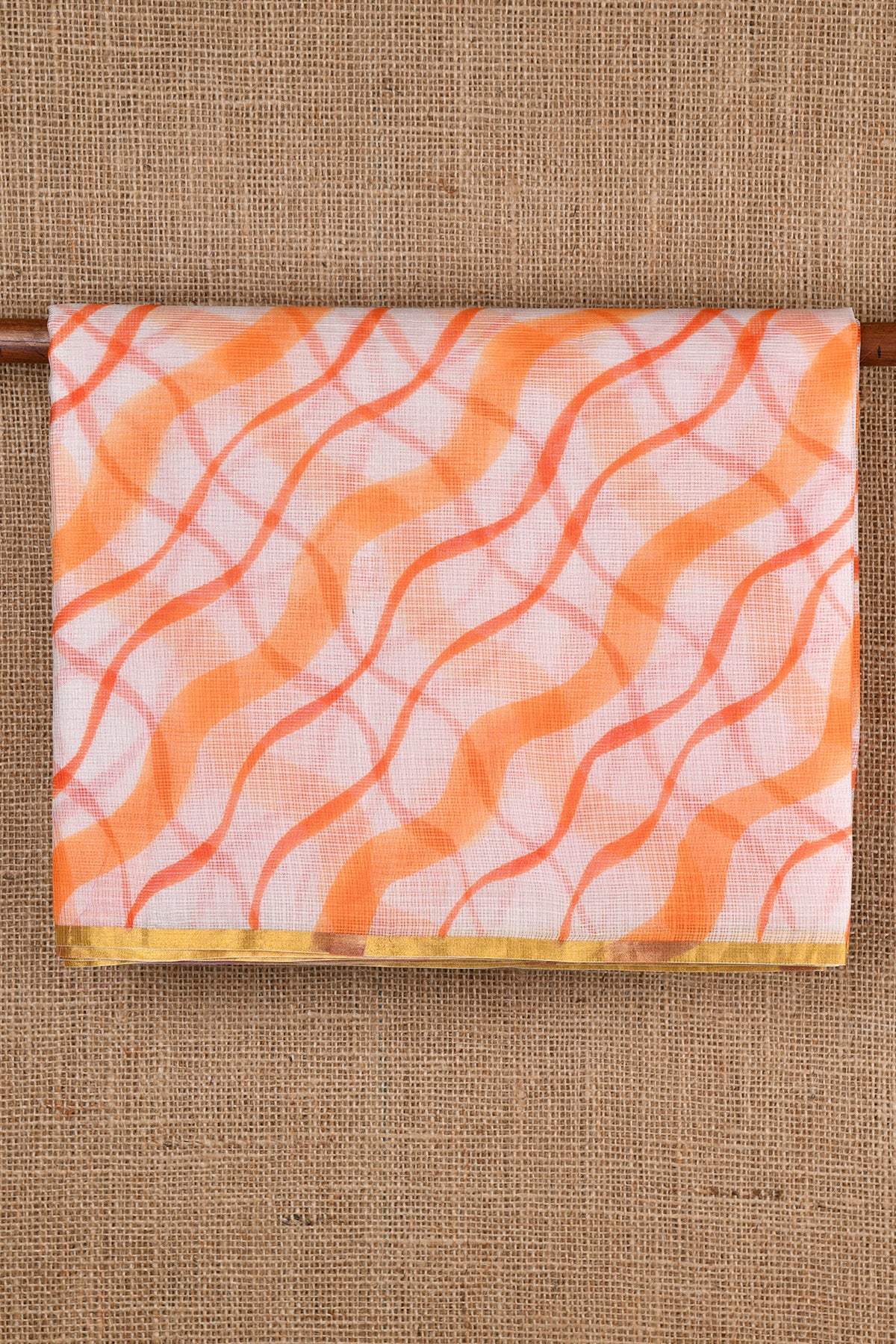 Orange Waves Design Off White Kota Silk Saree