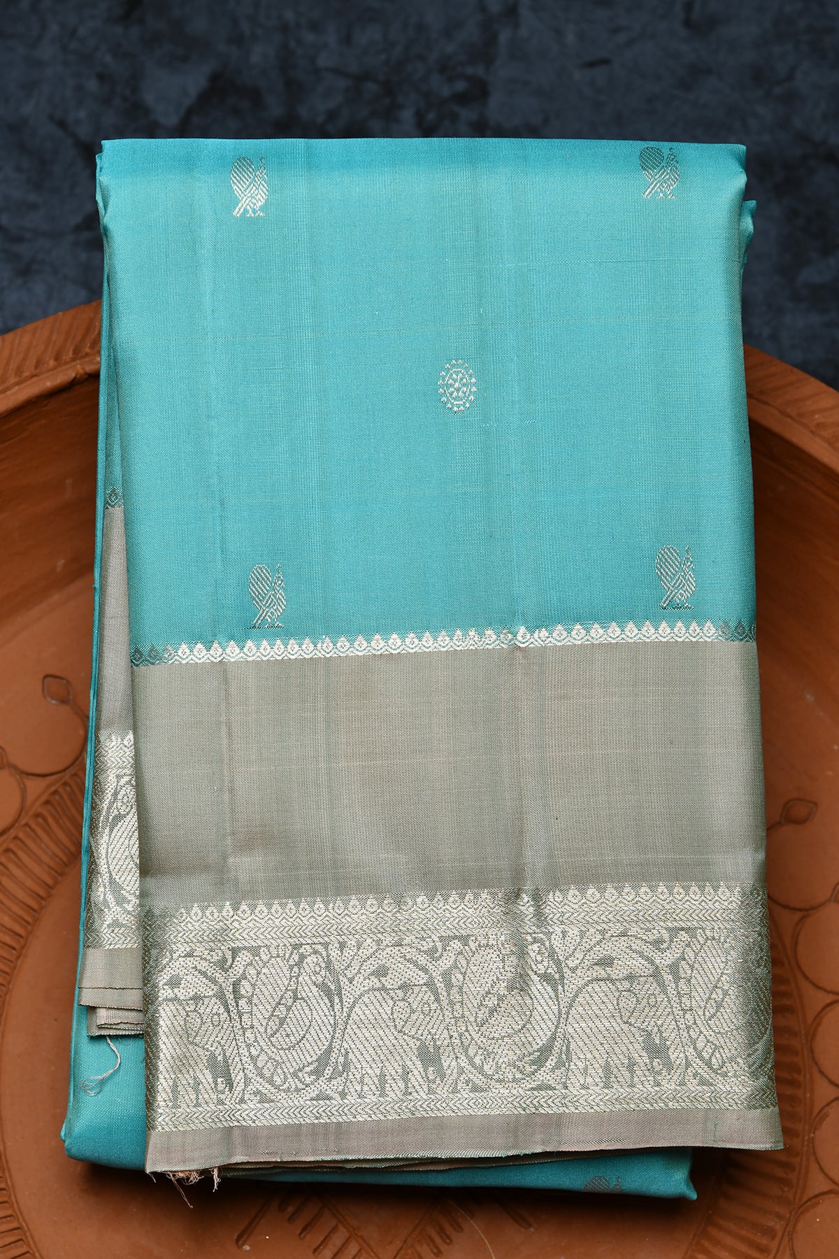 Silver Zari Rettai Pettu Border With Peacock And Rudraksh Buttis Turquoise Blue Kanchipuram Silk Saree