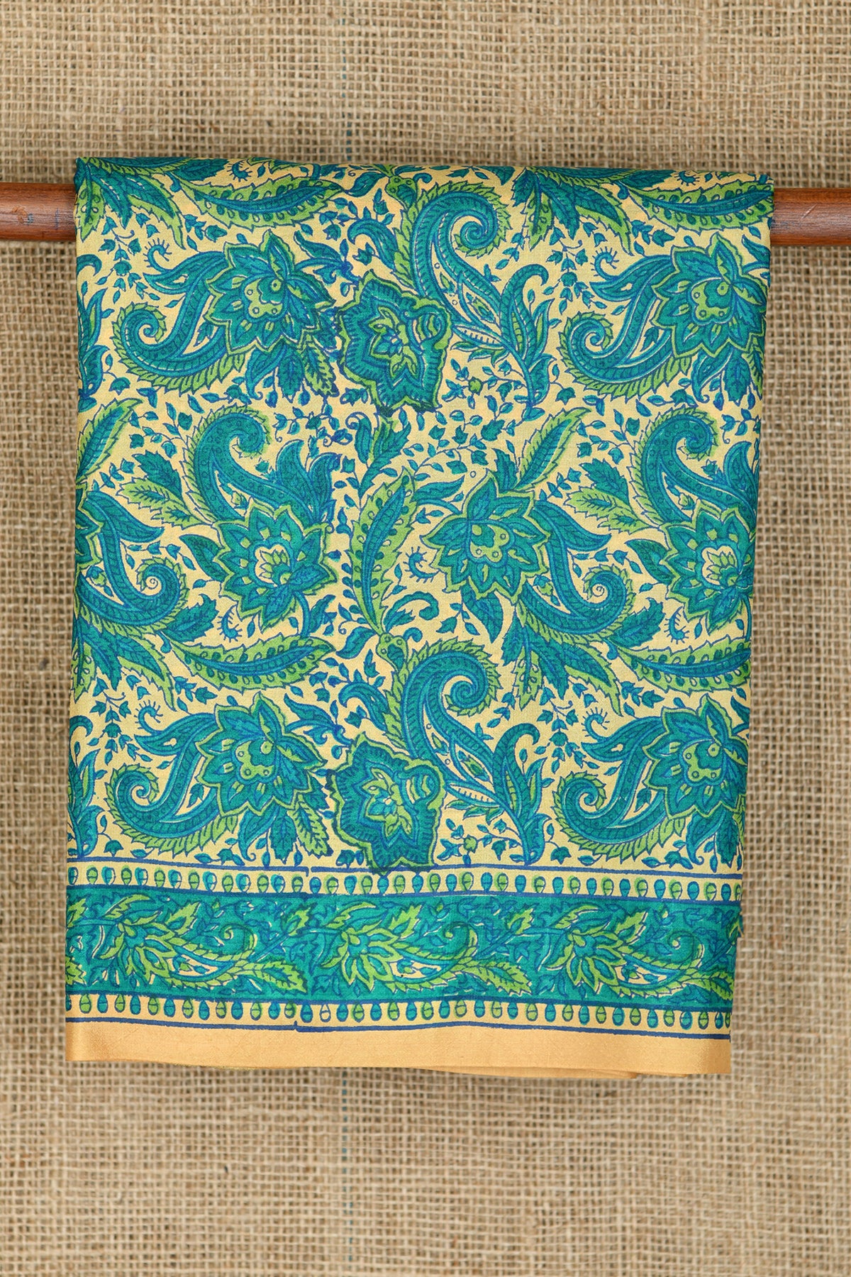Paisley Floral Design Cream And Teal Green Printed Silk Saree