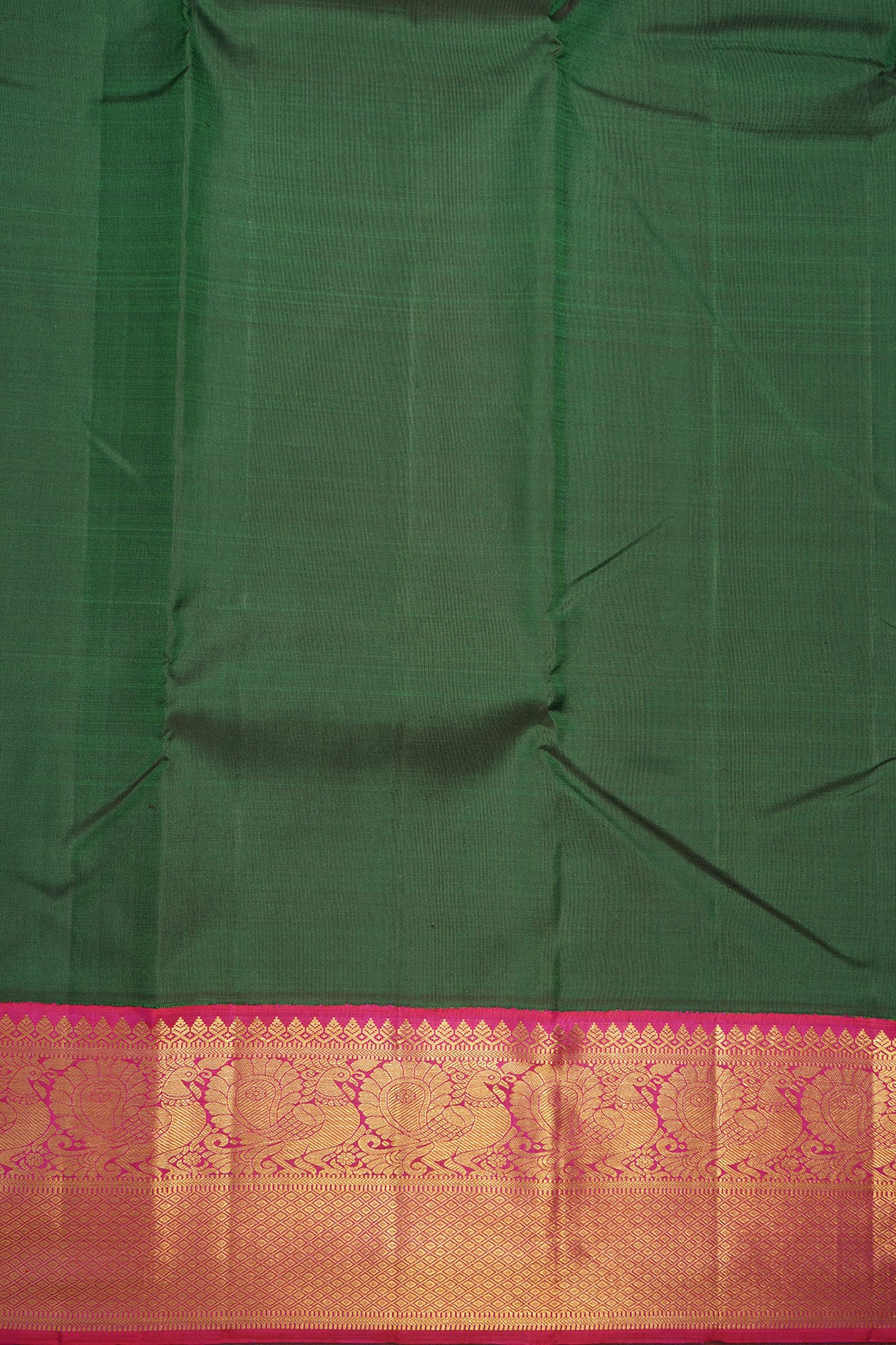 Peacock And Diamond Zari Border Plain Bottle Green Kanchipuram Silk Saree
