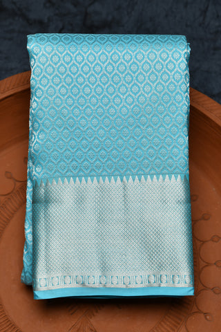 Silver Zari Mayilkan Border With Ogee Pattern And Buttis Aqua Blue Kanchipuram Silk Saree