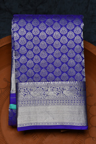 Silver Zari Peacock And Yazhi Design Border With Buttis Cobalt Blue Kanchipuram Silk Saree
