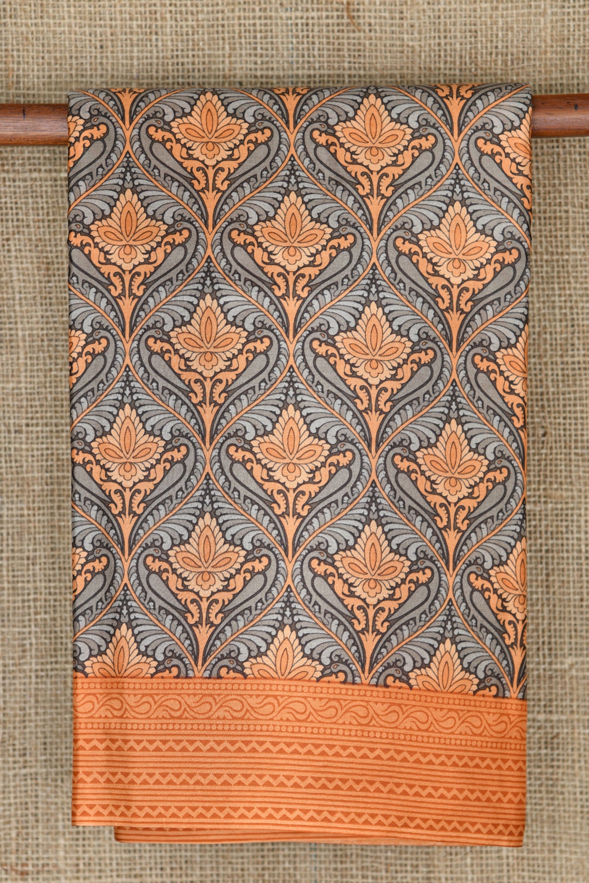 Ogee Pattern Grey And Orange Printed Silk Saree