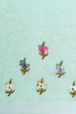 Silver Zari Border With Embroidered Floral Design Pastel Green Linen Saree
