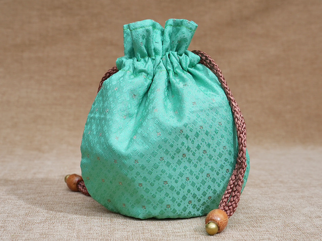 Assorted Set Of 4 Allover Design Banaras Silk Potli Bags
