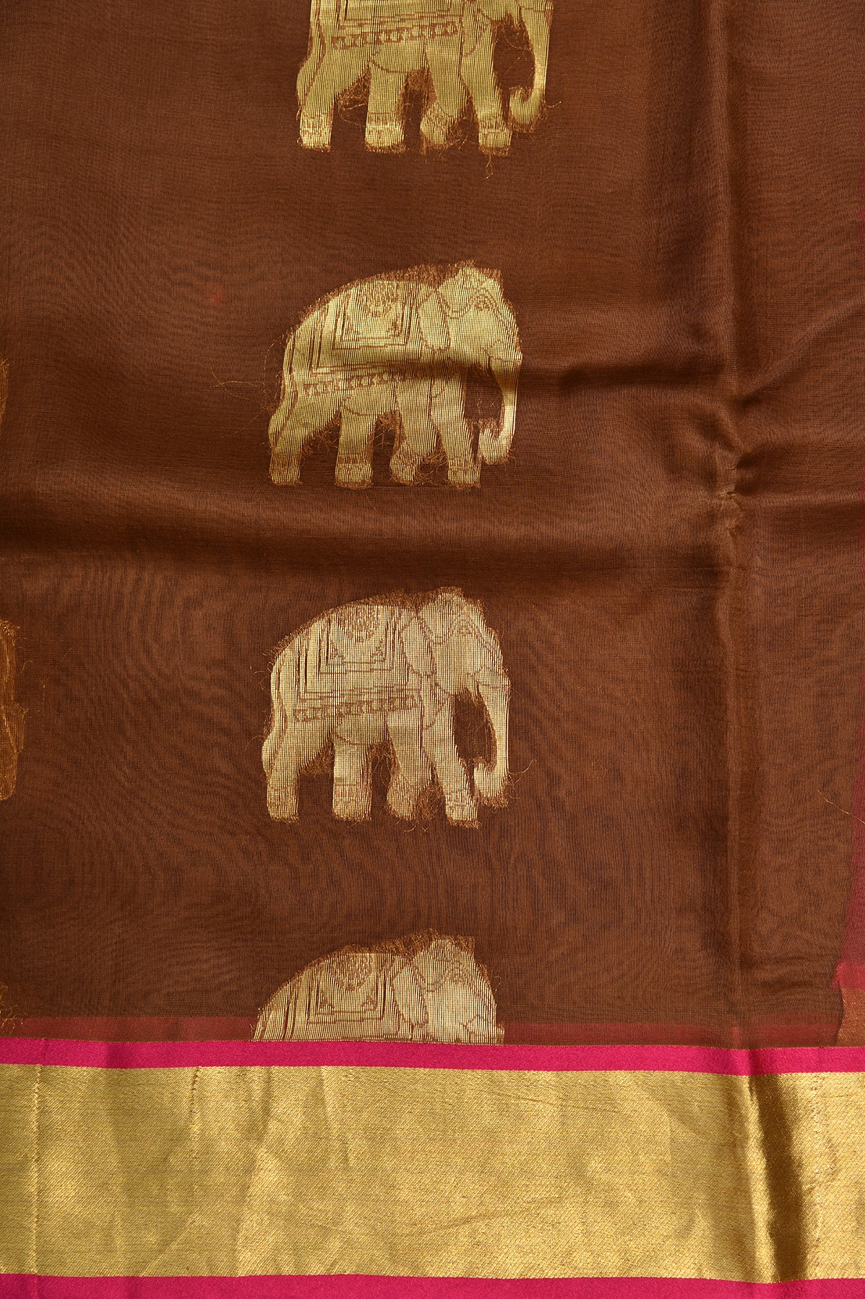Zari Border With Elephant Motif Brown Organza Silk Saree