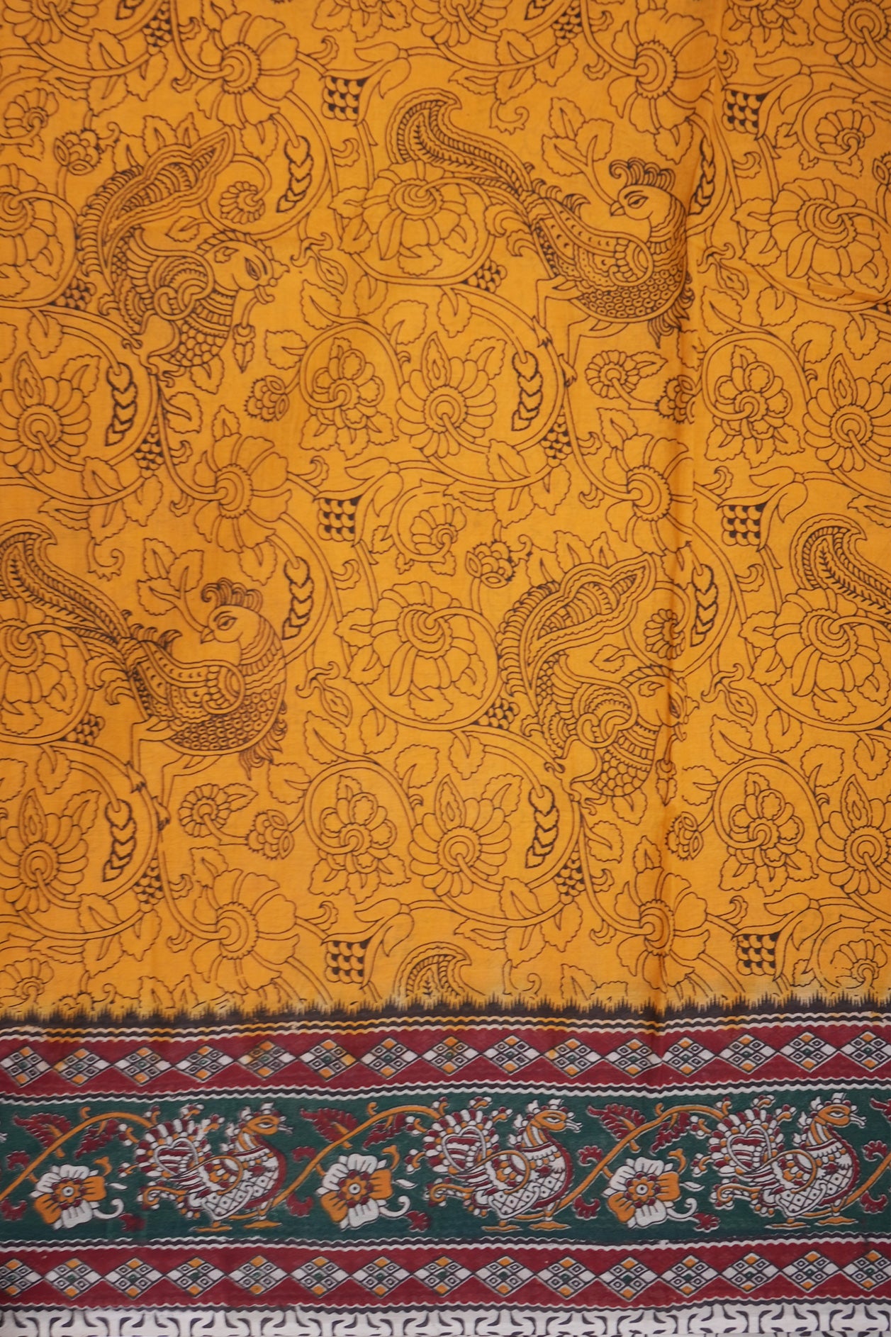 Allover Peacock And Floral Design Mango Yellow Printed Kalamkari Cotton Saree