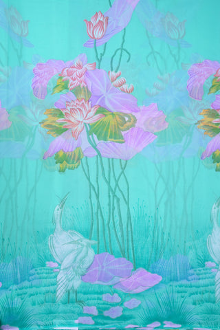 Crane And Lotus Printed Turquoise Blue Chiffon Saree