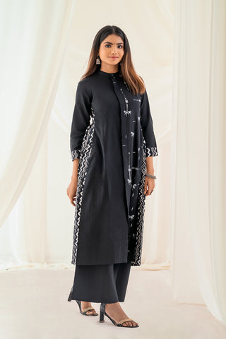 Black Salwar Set With Printed Fabric Over The Back And On The Cuff