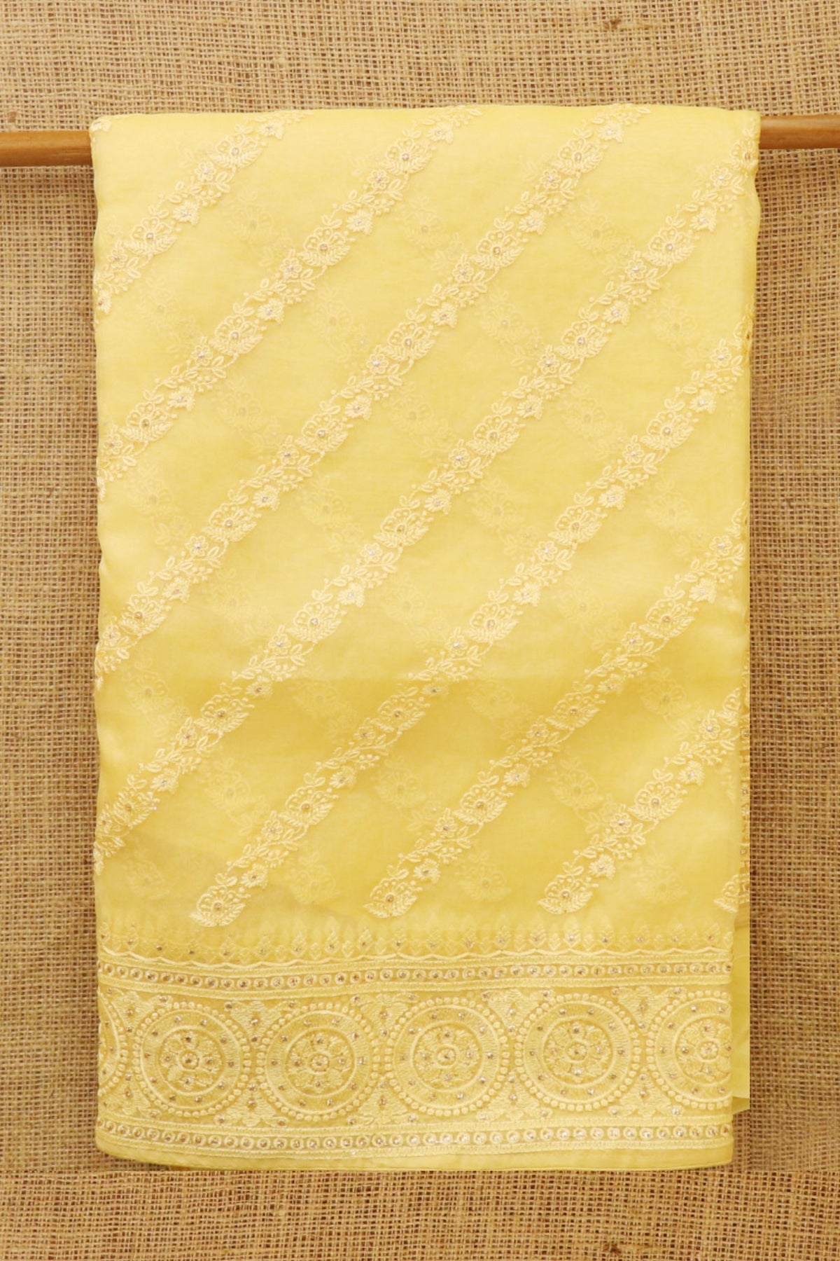 Chakram Border With Embroidered Stripes Soft Yellow Organza Silk Saree