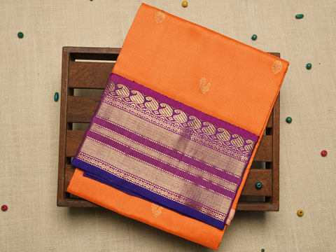 Contrast Korvai Border With Traditional Buttas Bright Orange Kanchipuram Silk Unstitched Pavadai Sattai Material
