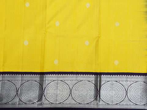 Contrast Silver Zari Border In Buttas Melon Yellow Kanchipuram Silk Unstitched Pavadai Sattai Material