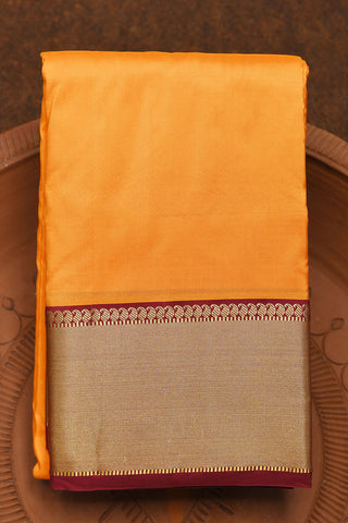 Contrast Zari Border In Plain Marigold Yellow Kanchipuram Silk Saree