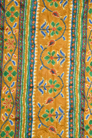 Embroidered And Geometric Pattern Green Semi Raw Silk Saree