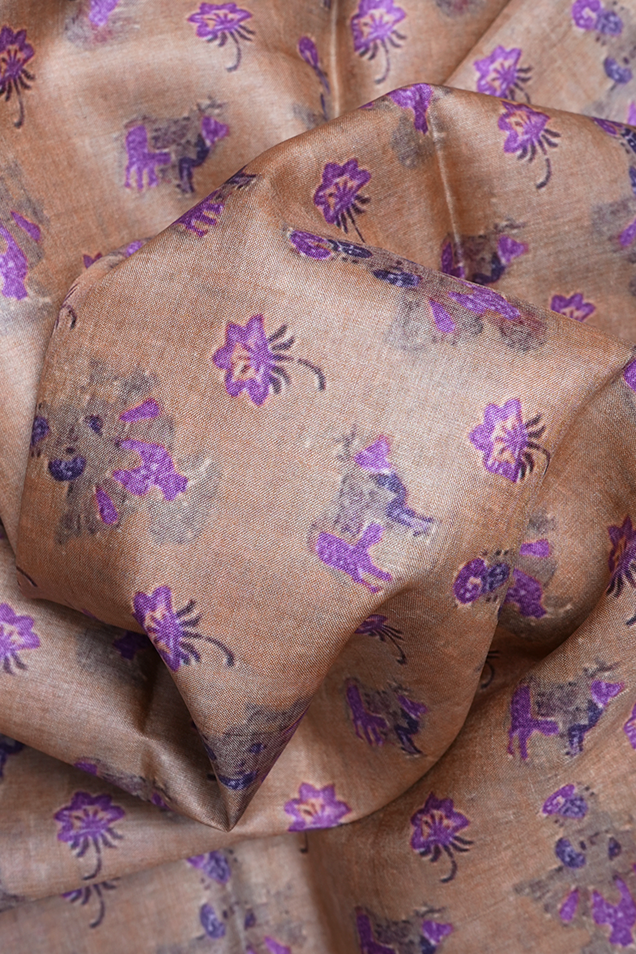 Allover Floral And Cow Printed Dusty Brown Tussar Silk Saree
