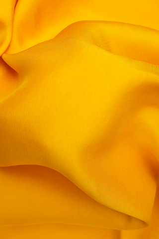 Floral Border Plain Saffron Yellow Mysore Silk Saree